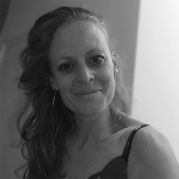 a black and white photo of a woman with a white background