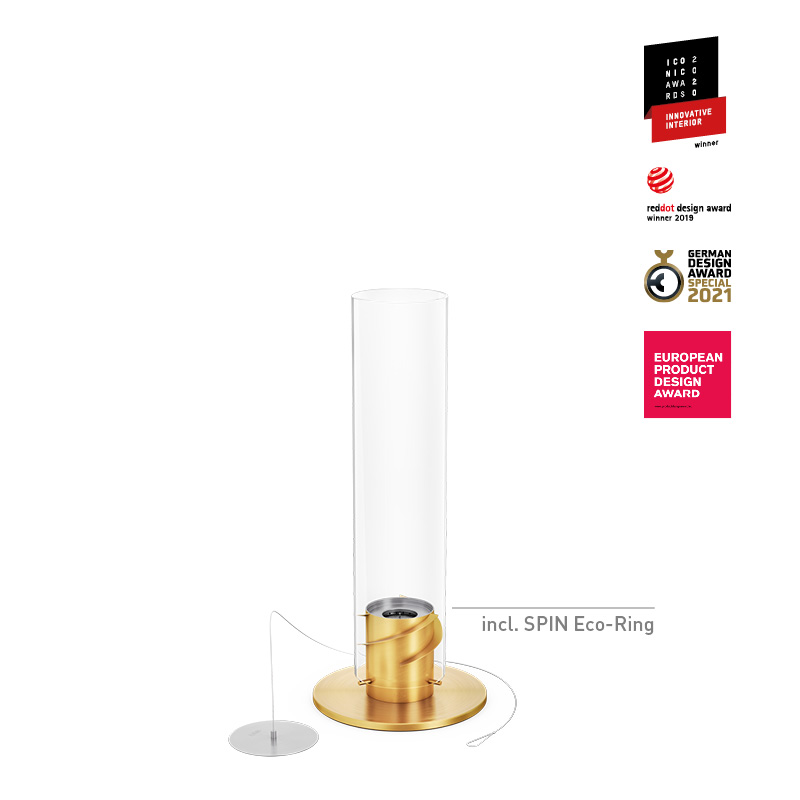 SPIN 900 Tabletop Fireplace gold The photo presents the gold and white glass cylinder is shown with a gold base, with the SPIN 900 Tabletop Fireplace gold.