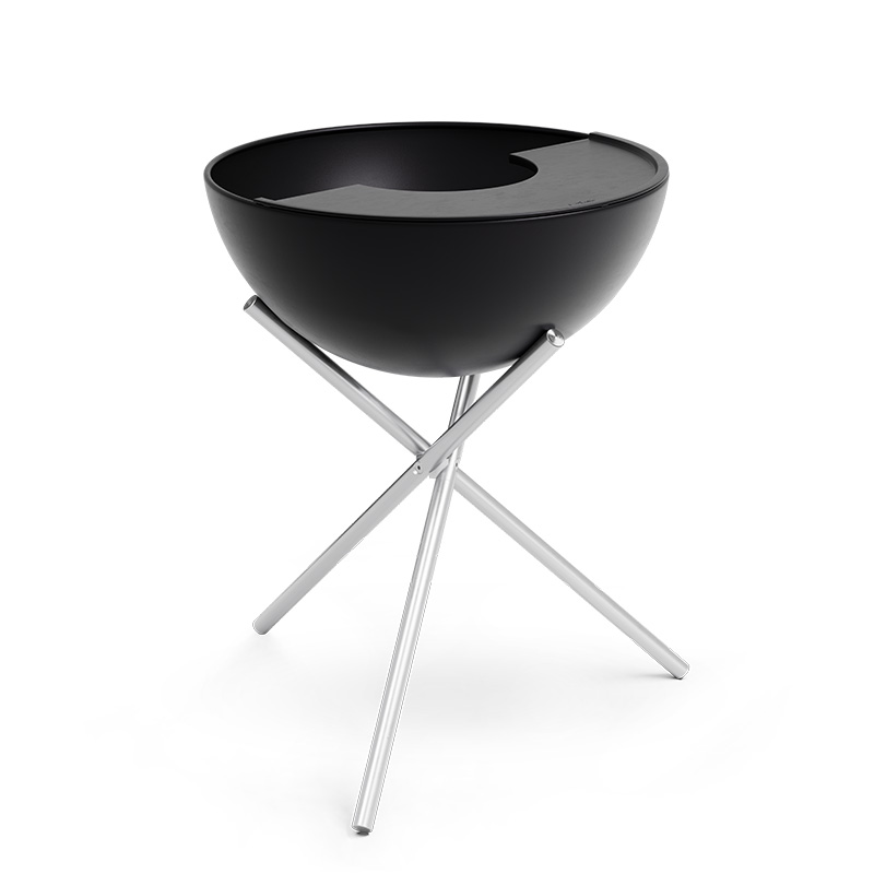 BOWL 70 Plancha An inviting scene with a black bowl with a metal stand, highlighted by the presence of the 00263 Bowl 70 Plancha.